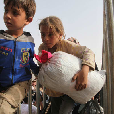Två syriska barn som flydde från Raqqa eller Deir al Zoor till Jordanien 10.9.2015