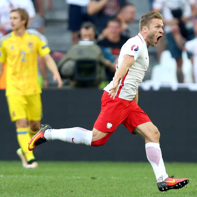 Jakub Blaszczykowski jublar efter sitt mål mot Ukraina.