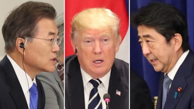 Japans premiärminister Shinzo Abe (till höger) stöder Trumps hotfulla uttalanden medan Sydkoreas president Moon Jae-In (till vänster) är kritisk