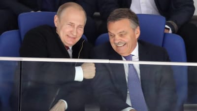 Vladimir Putin och René Fasel under VM-finalen 2016.
