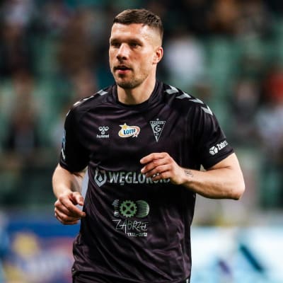 Lukas Podolski löper.