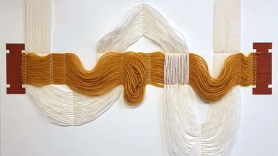 Ett konstverk gjort av garntråd