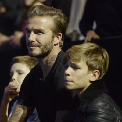 David Beckham i tennispubliken.