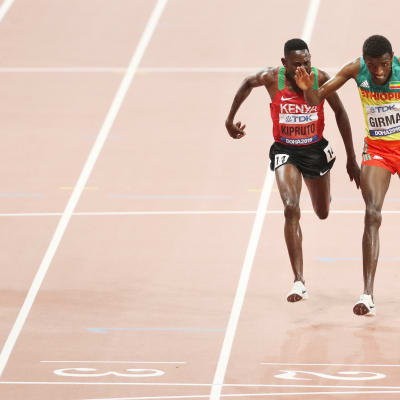 Kenian Conseslus Kipruto ja Etiopian Lamecha Girma
