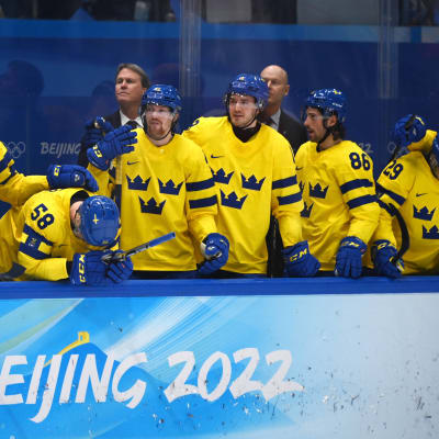 (220219) - BEIJING, Feb. 19, 2022 (Xinhua) - Athletes of Sweden react after the ice hockey men's play-off semifinal of Beijing 2022 Winter Olympics between ROC and Sweden at National Indoor Stadium in Beijing, capital of China, Feb. 18, 2022.

