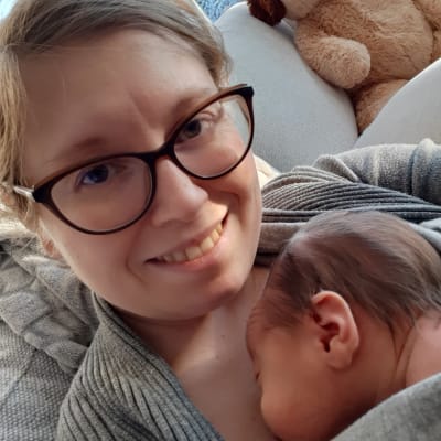 Kvinna med baby.