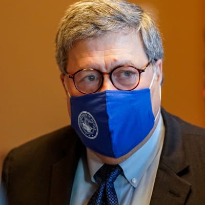 USA:s justitieminister William Barr iförd munskydd