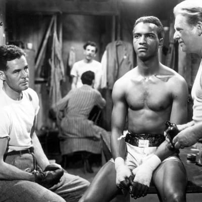 Vasemmalla Robert Ryan, oikealla George Tobias elokuvassa Viimeinen isku