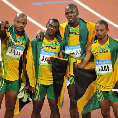 Asafa Powell, Nesta Carter, Usain Bolt och Michael Frater tappar guldet från Peking-OS.