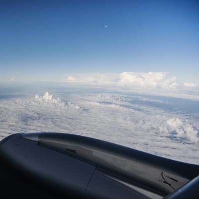 Lentokoneesta käsin otetussa valokuvassa näkyy maisema pilvien yläpuolella syyskuussa 2020.
