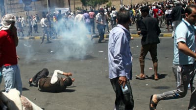 Sammandrabbning mellan demonstranter och houthi-rebeller i Taiz den 22 mars 2015.