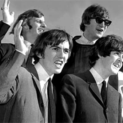 The Beatles saapumassa San Franciscon lentokentälle vuonna 1964.