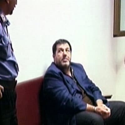 Salvatore Coluccio pidätettynä poliisiasemalla