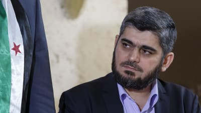 Mohammed Alloush, chefsförhandlare för HNC, under Genèvesamtalen 18.3.2016