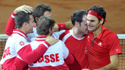 Schweiz och Roger Federer firar.