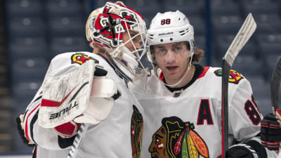 Kevin Lankinen och Patrick Kane.