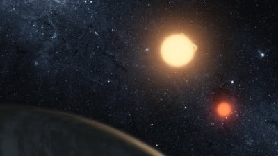 Artistvision av planeten Keplar-16b med två solar.