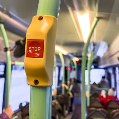 Stoppknapp i en buss.