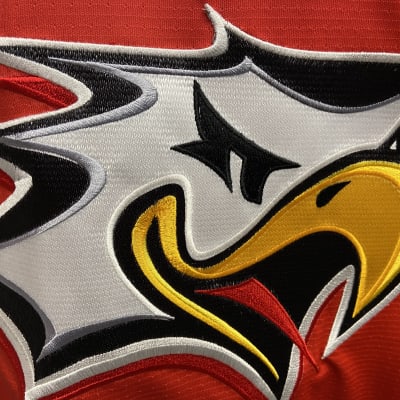 Sportin logo pelipaidassa
