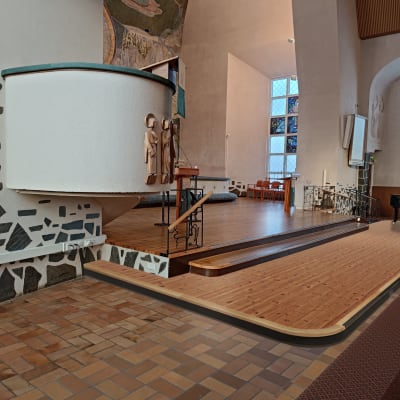 Rovaniemen kirkon etuosaa kuvaavassa havainnekuvassa näkyy alttarialueen laajennus.
