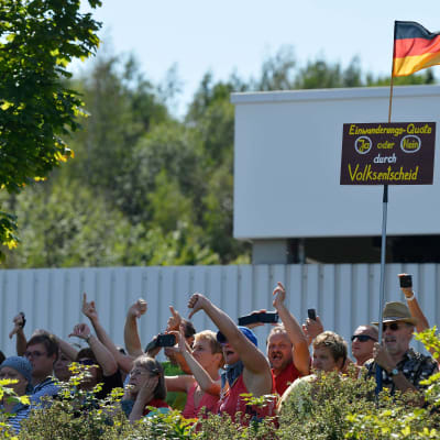 Protester mot Angela Merkel i Heidenau