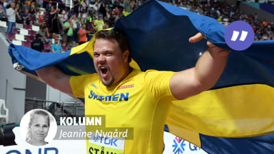 Daniel Ståhl firar med Sveriges flagga i händerna.