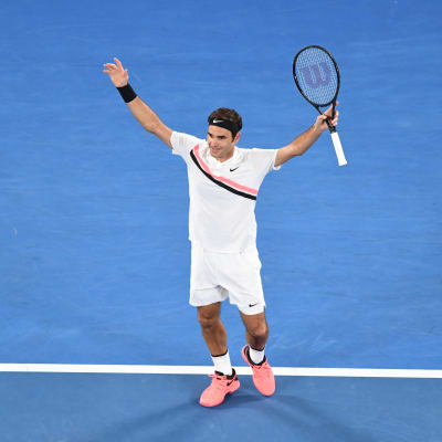 Roger Federer jublar efter sin 20:e seger i en grand slam-turnering.