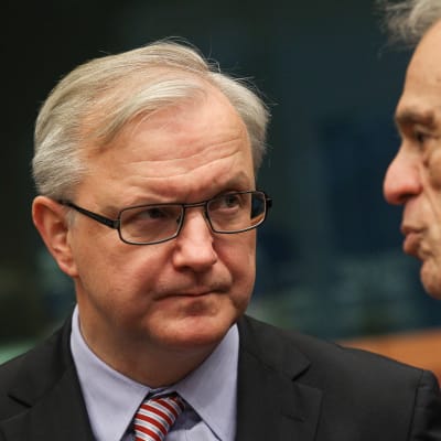EU:s ekonomikommissionär Olli Rehn och Cyperns finansminister Michael Sarris