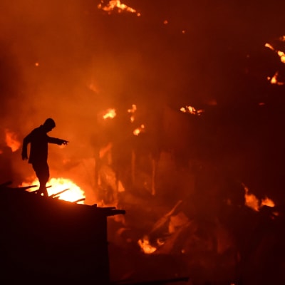 Den stora branden som förstörde 15 000 hem i ett slumområde i huvudstaden Dhaka i Bangladesh den 16 augusti 2019.