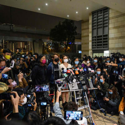 Gripna demokratiaktivister i Hongkong håller en presskonferens 