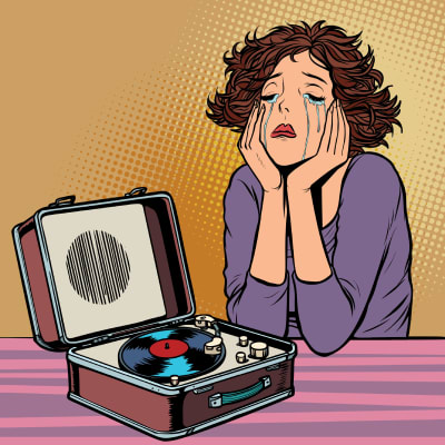tecknad bild av en kvinna som lyssnar på musik och gråter. 