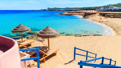 Steps from coastal bar to Cala Comte beach, Ibiza island, Spain  