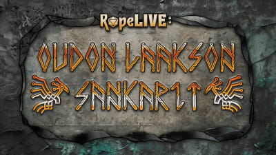 Teksti "RopeLIVE: Oudon laakson sankarit" kirjoitettu virtapiirejä ja riimuja matkivalla tyylillä betoniselle ja kiviselle pohjalle