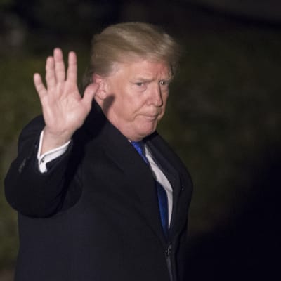 Trump flög iväg till det ekonomiska forumet i Davos på onsdag kväll, lokal tid