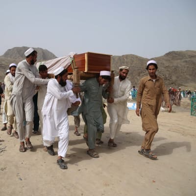 Begravning av en människa som dödades i en självmordsattack den 16 juni.