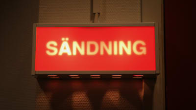 Skylt med texten sändning