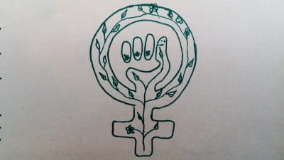 kvinnosymbol med knytnäve och gröna blad teckand med tusch på papper
