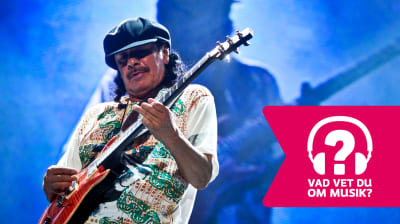 Carlos Santana spelar elgitarr.