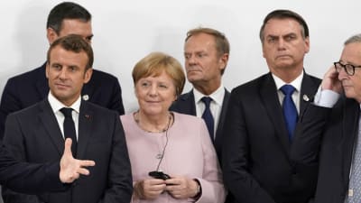 G20-mötet i Osaka 29.6.2019. Emmanuel Macron, Angela Merkel, Donald Tusk, Jair Bolsonaro