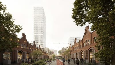 Ett högt torn i vitt med stora fönster i maskinverkstadsområde i Böle.