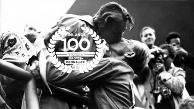 Emil Zatopek och frun Dana Zatopeka, OS 1952, med logon för Finlands 100 största idrottsögonblick.