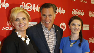 Mitt Romney med sin hustru Ann Romney och deras barnbarn Allie Romney.