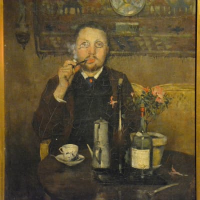Porträtt av Ville Vallgren vid frukostbordet av Allan Österlind.