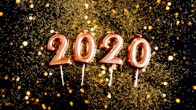 Ballonger med texten 2020 på glittrig bakgrund