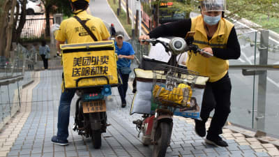 Motorcykelförare i Meituan, Kina. 
