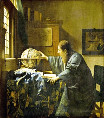 Johannes Vermeerin maalaus Tähtitieteilijä: siniseen, kaapumaiseen asuun pukeutunut pitkätukkainen nuorehko mies istuu renessanssin aikaisen työhuoneensa tuolissa ja kurottaa kättään kohti ikkunan alla olevaa karttapalloa.