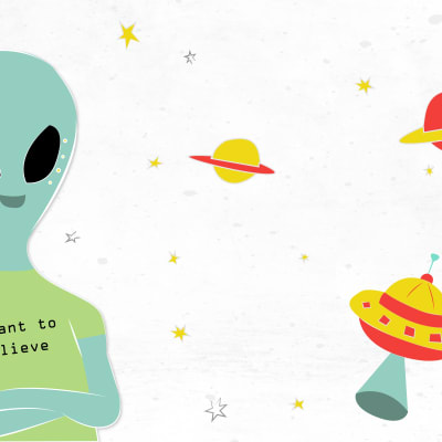 Avaruusolento, jolla lukee t-paidassa I want to believe.