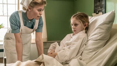 Sjuksköterska och barnpatient