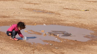 Ett syriskt flyktingbarn i flyktinglägret Zaatari vid den jordanska staden Mafraq nära den syriska gränsen.