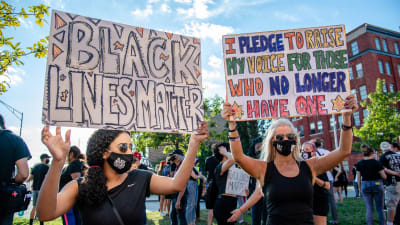 Personer demonstrerar i samband med en demonstration i Cincinnati den 4 september 2020.